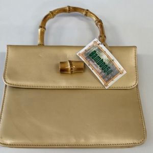 Gold bamboo handle purse